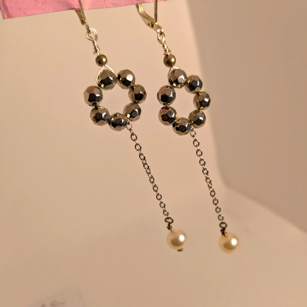 Silver faceted Circle earrings